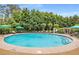 Inviting pool area with comfortable seating and lush landscaping, creating a serene outdoor escape at 700 Park Regency Ne Pl # 1407, Atlanta, GA 30326