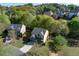 Aerial view of the home showing roof, front yard and neighborhood at 2155 Mindy Ln, Cumming, GA 30041