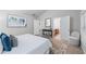 Inviting primary bedroom with serene decor, open doorways, and soft textures at 2155 Mindy Ln, Cumming, GA 30041