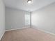 Carpeted bedroom with window allowing natural light at 2155 Mindy Ln, Cumming, GA 30041
