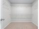 Spacious walk-in closet with wire shelving for optimal storage and organization at 2155 Mindy Ln, Cumming, GA 30041