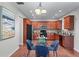 Charming kitchen with wooden cabinets, stainless steel appliances, and a cozy breakfast nook at 2155 Mindy Ln, Cumming, GA 30041
