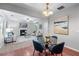 Bright living and dining areas featuring a fireplace and stylish modern decor at 2155 Mindy Ln, Cumming, GA 30041