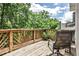 View of a wooden deck overlooking the wooded area at 2682 Boulder Creek Ne Dr, Roswell, GA 30075