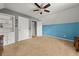 Bedroom featuring neutral carpet and a built-in storage unit with a serene color palette at 411 Hollis Cir, Dallas, GA 30157