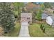 Charming two-story home with well-manicured lawn, and a long concrete driveway at 4567 Hickory Forest Nw Dr, Acworth, GA 30102
