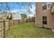 Spacious backyard with a wooden fence, and well-maintained lawn at 4567 Hickory Forest Nw Dr, Acworth, GA 30102