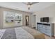 Bedroom featuring a full-size bed, dresser, and a ceiling fan at 4567 Hickory Forest Nw Dr, Acworth, GA 30102