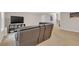 Bonus room with neutral walls, carpet, a television, and a leather couch at 4567 Hickory Forest Nw Dr, Acworth, GA 30102
