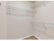 Walk-in closet with wire shelving and neutral carpeting for ample storage at 4567 Hickory Forest Nw Dr, Acworth, GA 30102