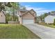 Lovely home with a two-car garage and charming curb appeal at 4567 Hickory Forest Nw Dr, Acworth, GA 30102