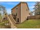 Two story house with stairs leading to a small deck at 4567 Hickory Forest Nw Dr, Acworth, GA 30102