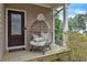 Cozy front porch with an egg chair at 4567 Hickory Forest Nw Dr, Acworth, GA 30102