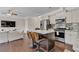 Open-concept kitchen with stainless appliances, granite counters, and open to the living room at 4567 Hickory Forest Nw Dr, Acworth, GA 30102