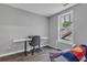 Office with light grey walls, wood floor, a large window, and desk space at 4567 Hickory Forest Nw Dr, Acworth, GA 30102