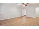 Large bedroom with hardwood floors and closet at 525 Forest Pl, Roswell, GA 30076