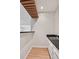 Wet bar area with modern cabinetry, sink, and views into other living spaces at 525 Forest Pl, Roswell, GA 30076