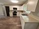 Updated kitchen with plenty of counter space and new appliances at 595 Crowell Rd, Porterdale, GA 30014