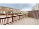 Back deck offers a view of the community and other townhomes, adding to the outdoor living space at 753 Topsail Ln, Alpharetta, GA 30005