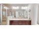 Bathroom features a double sink vanity with granite countertops and modern lighting at 753 Topsail Ln, Alpharetta, GA 30005