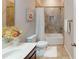 Bathroom features a tiled shower over tub with a large single sink vanity at 753 Topsail Ln, Alpharetta, GA 30005