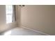 Bedroom with neutral paint and a window at 1481 Park Knoll Trl, Lawrenceville, GA 30043