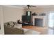 Warm living room features hardwood floors, a fireplace, and an adjacent dining area at 1481 Park Knoll Trl, Lawrenceville, GA 30043