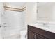 The bathroom features a shower and tub combo with a mosaic backsplash and a single vanity at 1544 Overview Cir, Lawrenceville, GA 30044