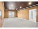 This spacious living room features unique ceiling trim, recessed lights, and French doors at 1544 Overview Cir, Lawrenceville, GA 30044