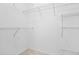 Empty walk-in closet equipped with wire shelving for ample storage solutions at 1544 Overview Cir, Lawrenceville, GA 30044