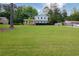 Two-story home on a large lot with lush green lawn at 3407 Larch Pine Dr, Duluth, GA 30096