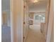 Hallway with a glimpse into the kitchen and nearby living areas at 3407 Larch Pine Dr, Duluth, GA 30096