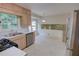 Open kitchen offers stainless steel appliances, view of backyard and easy access to dining area at 3407 Larch Pine Dr, Duluth, GA 30096