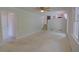 Cozy living room with a ceiling fan, stairs, and carpet flooring at 3407 Larch Pine Dr, Duluth, GA 30096