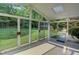 Beautiful sunroom with multiple glass doors providing abundant natural light and backyard views at 3407 Larch Pine Dr, Duluth, GA 30096