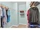 Walk-in closet featuring wire shelving and ample storage space for clothes and accessories at 408 Sam Cobb Ct, Woodstock, GA 30188