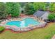 A lovely community pool offers a refreshing oasis for residents to enjoy in a private setting at 408 Sam Cobb Ct, Woodstock, GA 30188