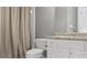 The bathroom features a toilet, a vanity with drawers and a granite countertop, as well as a shower with a curtain at 6209 Benbrooke Dr, Acworth, GA 30101