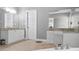 Luxurious bathroom with dual vanities, granite countertops, and tile flooring, offering a spa-like experience at 6209 Benbrooke Dr, Acworth, GA 30101