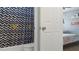 Bathroom view featuring a patterned shower curtain and a peek into the bedroom at 6209 Benbrooke Dr, Acworth, GA 30101