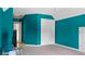 Large bedroom with blue walls, a closet and an open door at 6209 Benbrooke Dr, Acworth, GA 30101
