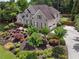 Stunning home with an attached garage and beautifully landscaped grounds at 6209 Benbrooke Dr, Acworth, GA 30101