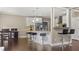 Open concept kitchen features an island with seating and stainless steel appliances for a modern look at 6209 Benbrooke Dr, Acworth, GA 30101