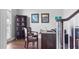 Cozy home office with hardwood floors, a built-in bookcase, and a comfortable desk at 6209 Benbrooke Dr, Acworth, GA 30101