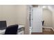 This is an office space with hardwood floors and desk space, perfect for remote work or study at 6209 Benbrooke Dr, Acworth, GA 30101