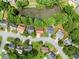 Houses surrounding a pond offer water views and a peaceful environment in a well-maintained neighborhood at 1647 Tunbridge Ln, Lawrenceville, GA 30043