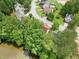 Pondside community with lush greenery, offering serene views and a tranquil atmosphere; ideal for nature lovers at 1647 Tunbridge Ln, Lawrenceville, GA 30043