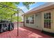 A cozy back deck with grill, perfect for outdoor entertaining and relaxation at 1647 Tunbridge Ln, Lawrenceville, GA 30043