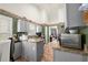 The kitchen has gray cabinets and countertop space to prepare meals at 1647 Tunbridge Ln, Lawrenceville, GA 30043