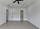 Minimalist bedroom with an ensuite marble-tiled bathroom at 165 Westbrook St, Buford, GA 30518